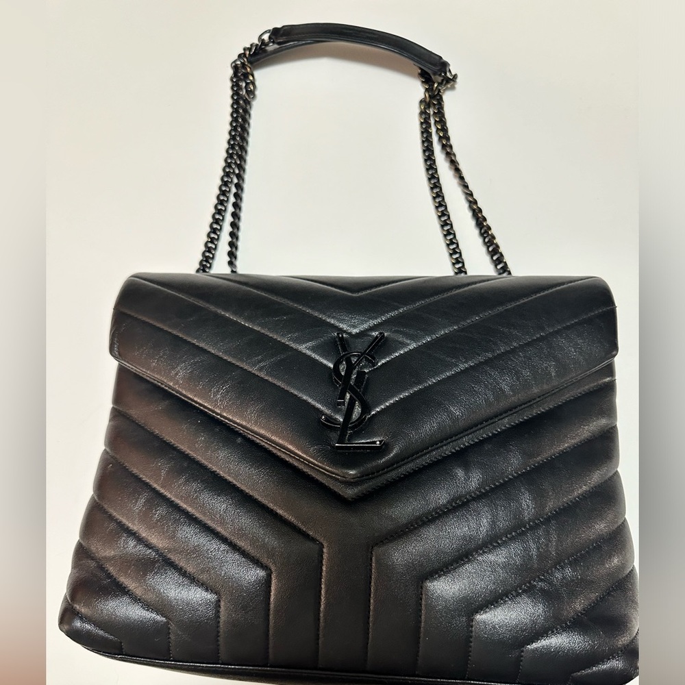 YSL BLACK ON BLACK  quilted leather can be worn as a crossbody style